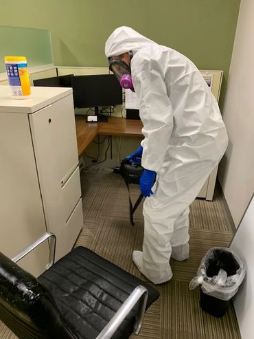 Technician spraying and fogging disinfectant for Covid19 Coronavirus.
