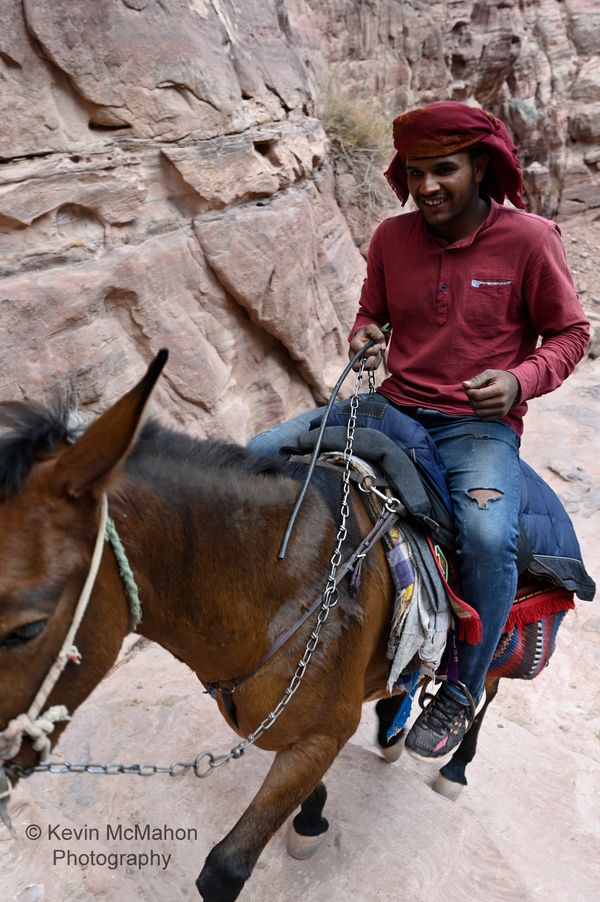 Jordan, Petra, Stairs to Monastery, man on donkey