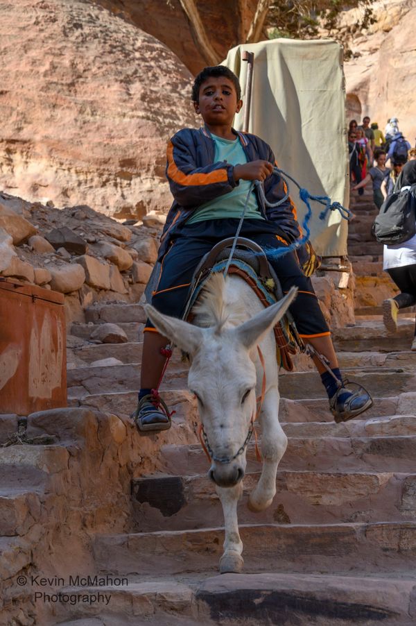 Jordan, Petra, Stairs to Monastery, boy and donkey