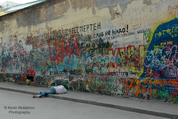 Moscow,  Arbat District, Viktor Tsoi Memorial, passed out drunk, dirty feet