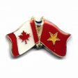 CANADA & NORTH VIETNAM FRIENDSHIP COUNTRY FLAG LAPEL PIN BADGE .. NEW AND IN A PACKAGE