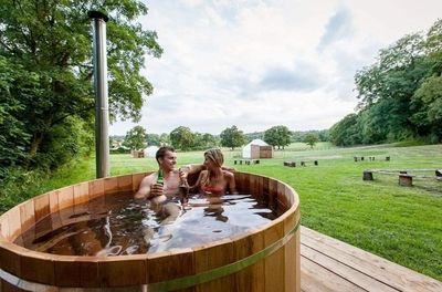 Large Cedar Wood Hot Tub in outdoor location
