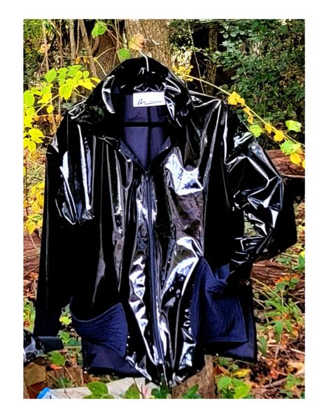 Hip length black rain jacket