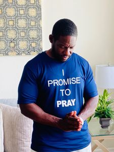 alt="Christian husband praying"