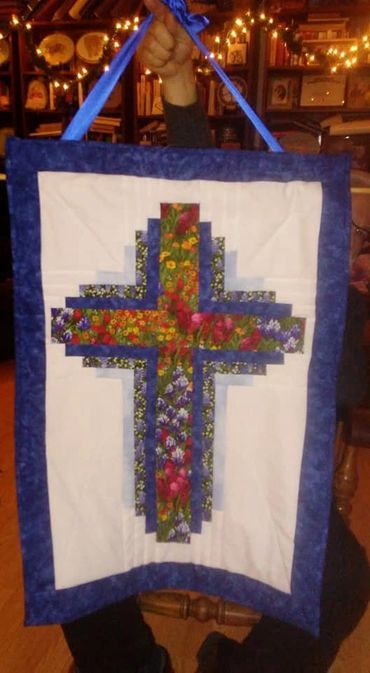 log cabin cross quilted wall hanging