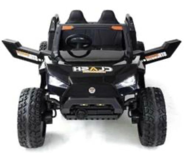 TOUCH TV , BLUETOOTH , 24V , GIANT BUGGY XL BLACK UTV AGES 1-10 RAZOR STYLE, PARE NTAL REMOTE CONTROL OR PRESS ON PEDAL AND GO.. LEATHER SEAT , RUBBER TIRES , 4WD .