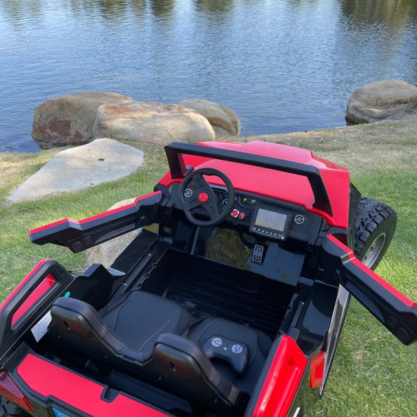24V TOUCH TV 4WD RUBBER TIRES , AGES 1-10 GIANT UTV RIDE ON , BUGGY, BLUETOOTH , REMOTE OR PRESS ON PEDAL AND GO .. BUGGY RUBBER TIRESADJUSTABLE LEATHER SEAT RED