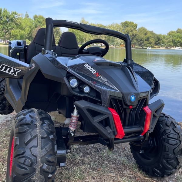 MONTHLY SPECIAL R/C TOUCH TV , 24v , 2x12 4x4 , UTV MX AGES 1-5 2000 , ATV, RAZOR STYLE, PARENTAL REMOTE CONTROL OR PRESS ON PEDAL AND GO.. LEATHER SEAT , RUBBER TIRES , 4WD . Black