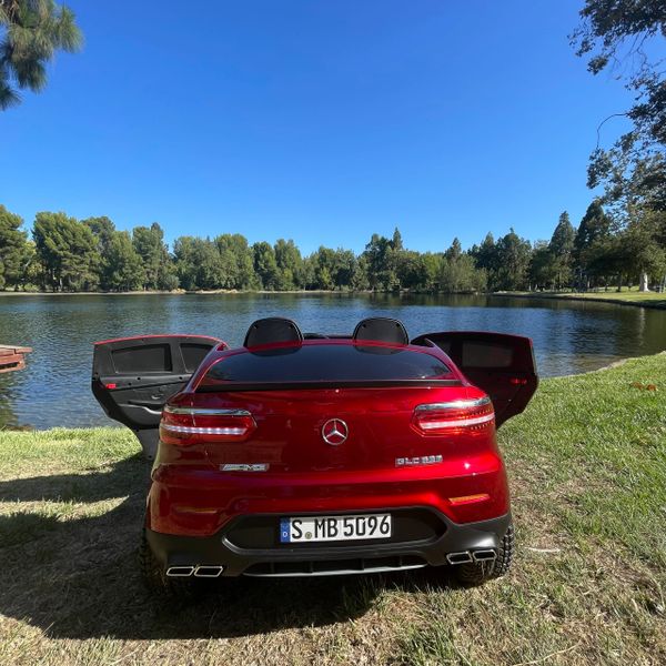 Ages 1-5 Licensed Mercedes GLC Two Seater Touch TV 24V Licensed Mercedes GLC REMOTE OR PRESS ON PEDAL AND GO .Spray Painted Red 4WD Painted Red Rubber Tires
