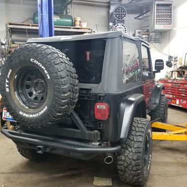 Jeep Wrangler after new top and muffler