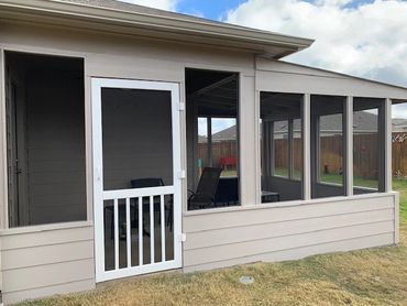 Screened-in porch with door