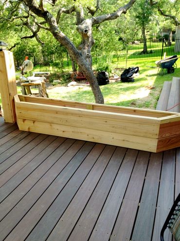 Custom Trex deck with cedar planter.