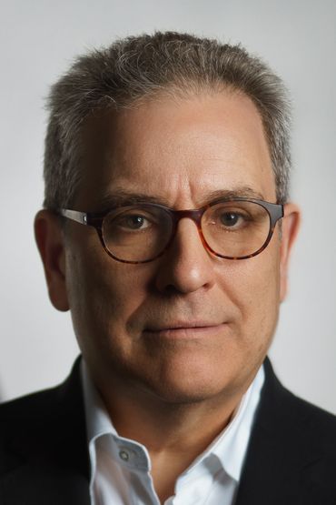 Her confidence Wearing suit with eyeglass and looking ahead