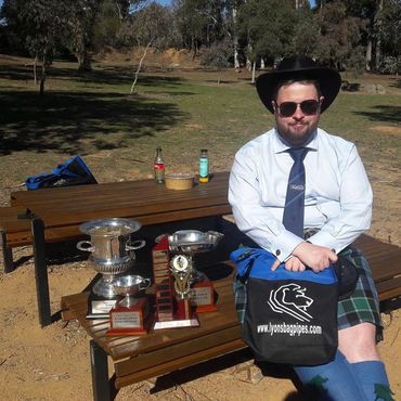 Sweeping the prizes at the ACT solo piping contest in Canberra, Australia. A very, very hot day. 