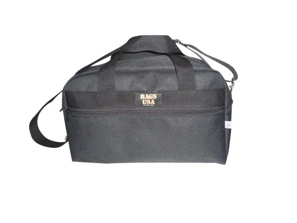 Cargo bag 15 inch wide has front pocket also slides over wheeled luggage handle.