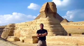 Bradley Williamson in Egypt at the Sphinx with the Great Pyramid of Giza in the background