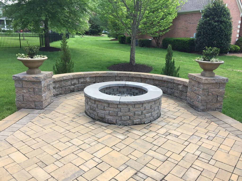 Paver patio with firepit and seating wall