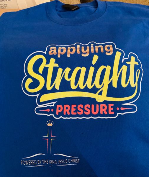 APPLYING STRAIGHT PRESSURE T-SHIRT -POWERED BY THE KING JESUS CHRIST CLOTHING LINE BY PROPHESTESS DEANNA DIXON