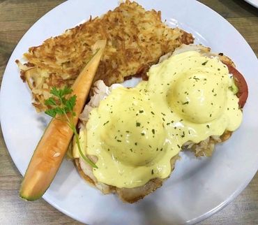 California Benedict - turkey, smashed avocado & tomatoes topped w/ Peg's lemony hollandaise.