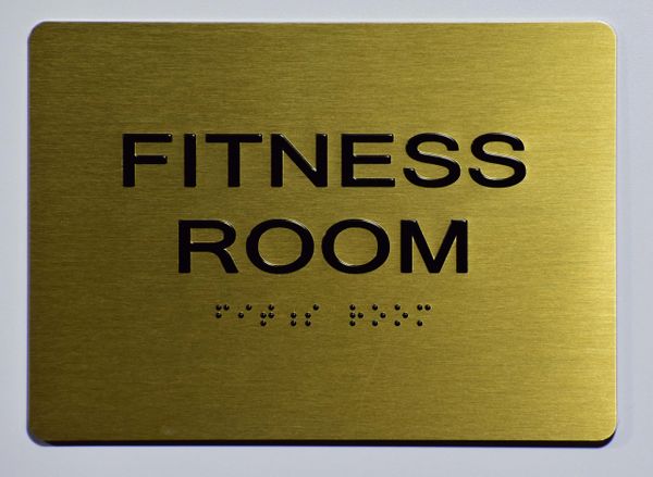 FITNESS ROOM Sign- GOLD- BRAILLE (ALUMINUM SIGNS 5X7)- The Sensation Line