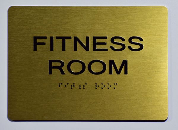 FITNESS ROOM Sign- GOLD- BRAILLE (ALUMINUM SIGNS 5X7)- The Sensation Line- Tactile Touch Braille Sign