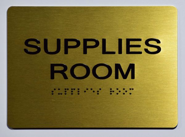 Supplies Room Sign - GOLD- BRAILLE (ALUMINUM SIGNS 5X7)- The Sensation Line- Tactile Touch Braille Sign