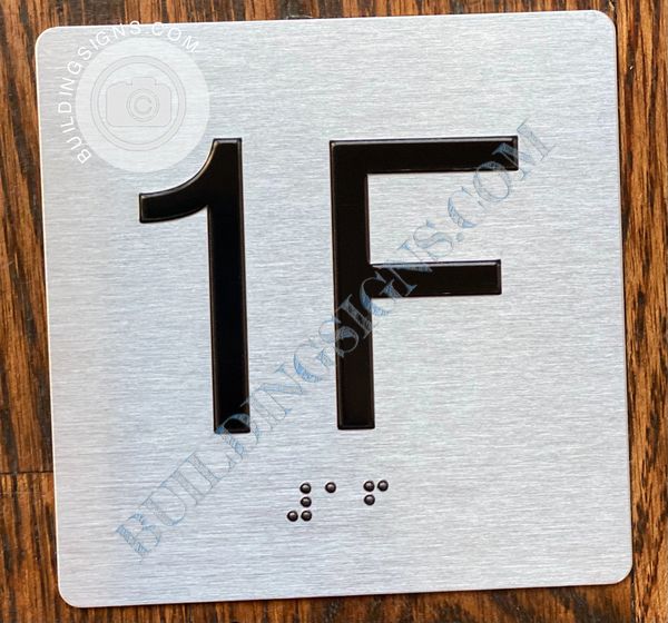 z- APARTMENT NUMBER SIGN – 1F -BRUSHED ALUMINUM (ALUMINUM SIGNS 4X4)- THE SENSATION LINE- Tactile Touch Braille Sign