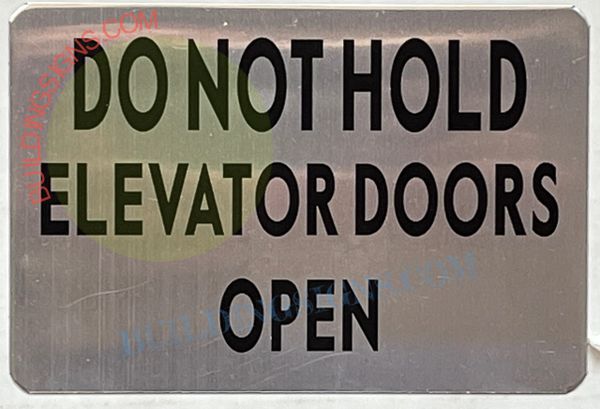 DO NOT HOLD ELEVATOR DOORS OPEN SIGN– BRUSHED ALUMINUM (ALUMINUM SIGNS 4X6)
