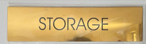 STORAGE SIGN – GOLD ALUMINUM (2X7.75)