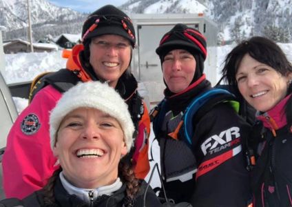 Snowmobile women smiling 