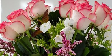 white roses with pink tips floral arrangement
