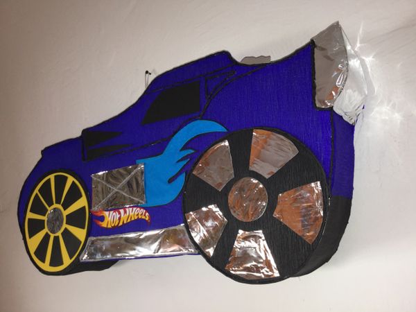 blue hot wheels inspired piñata, hot wheels pinata. hot wheels bi