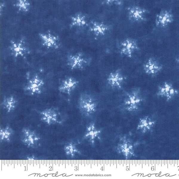 Moda Shimo. Medium blue with white snowflakes