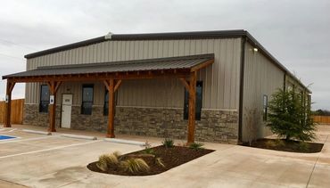 Sidewalk canopies or store front canopies. This one is timber framed with sheet metal canopy top. 