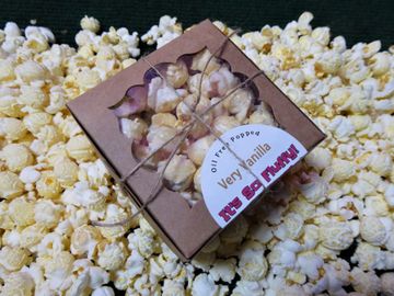 Caramel popcorn in small gift box perfect for Wedding favors and other party gifts.