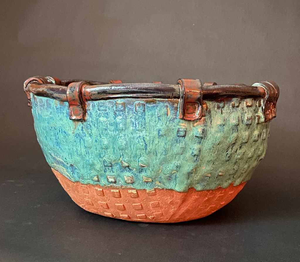 Sea Basket. Large, hand-built bowl. Red stoneware with textured body and strapped rim. 13 1/2” dia x