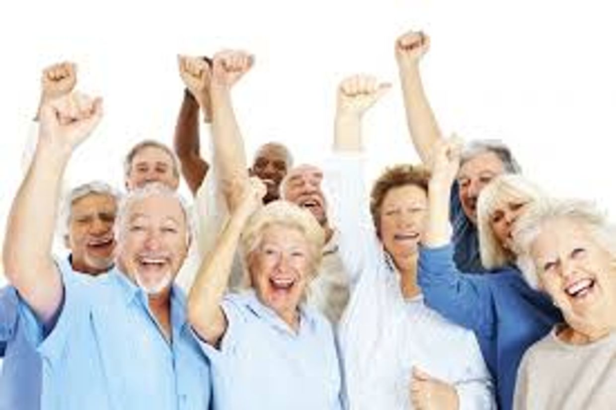 Happy senior citizens pumping their fists. Our seniors are satisfied with the Vets moving company. 