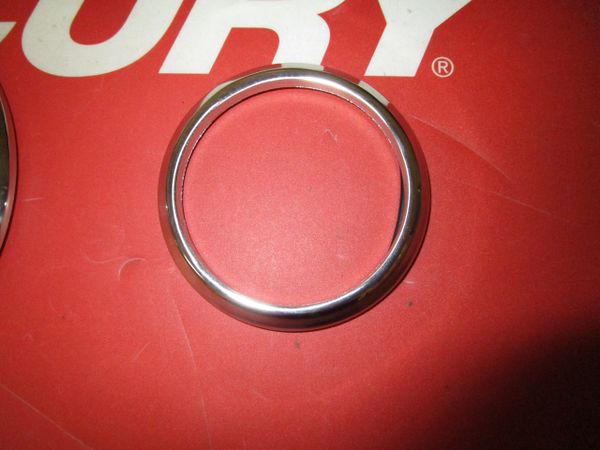 Stainless Steel bezel size is 2 5/8"