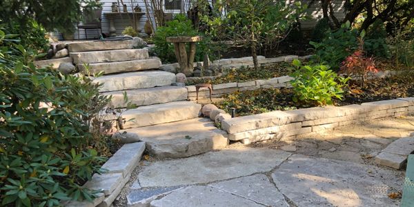 Natural stone steps and dry-cut retaining walls in Arlington Heights