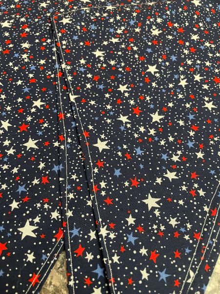 Red white blue stars on navy blue