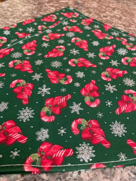 Candy canes on green