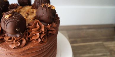 German chocolate cake with cake ball topper