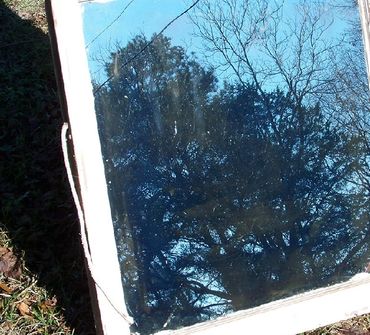 Hand-silvered antique window glass. A layer of pure silver reduced onto glass. 