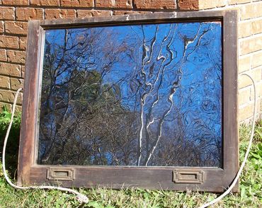 Hand-silvered antique window glass. A layer of pure silver reduced onto glass. 