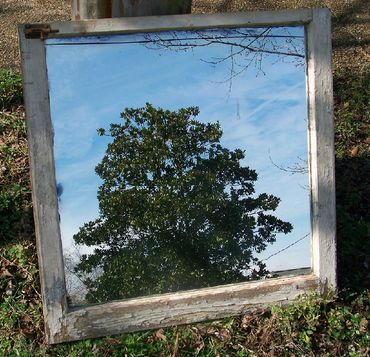 Hand-silvered antique window glass. A layer of pure silver reduced onto glass. 