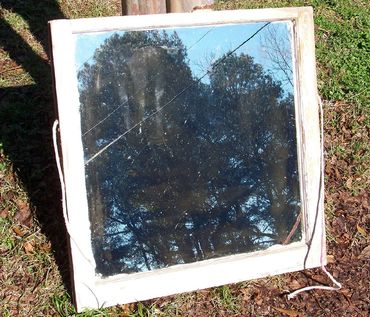 Hand-silvered antique window glass. A layer of pure silver reduced onto glass. 