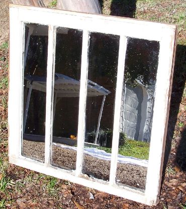 Hand-silvered antique window glass. A layer of pure silver reduced onto glass. 