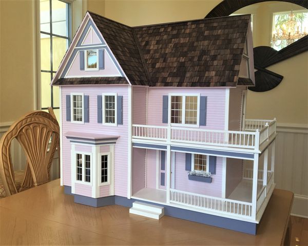 Original rotating Display Tables, Custom Dollhouses, and Play Barns made at Heirloom Custom Toys!