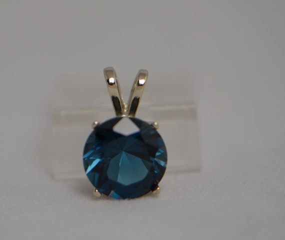 14kt White or Yellow Gold 9mm Round Genuine Topaz Pendant (London, Swiss or Sky Blue)