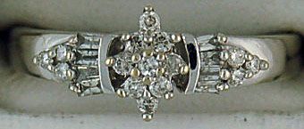 Ladies 1/4ctw Round and Baguette Diamond Cluster Ring